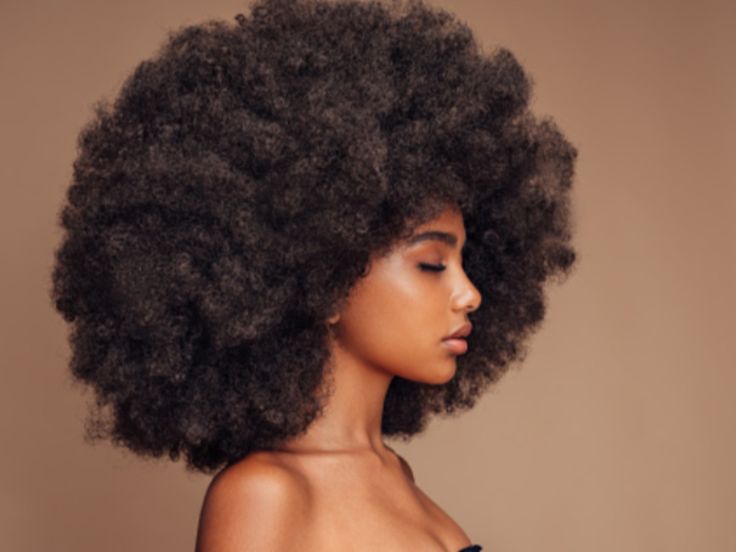 close up of 4C natural hair curl pattern texture afro hair type