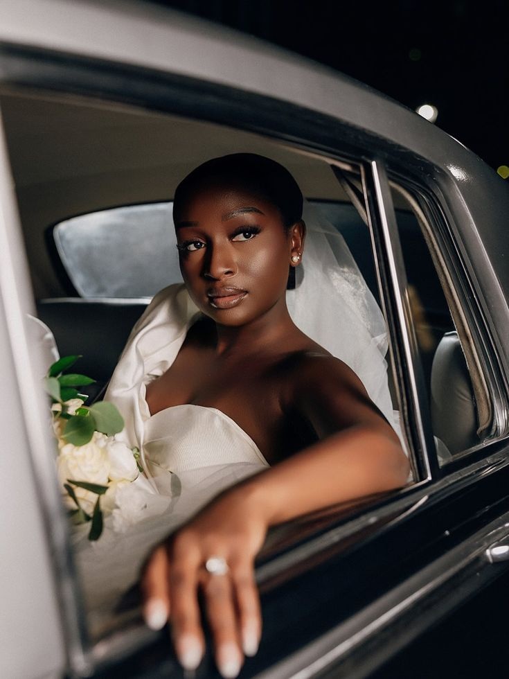 A beautiful bride in her car