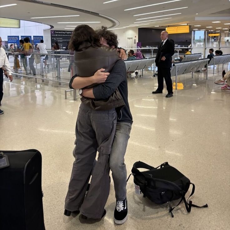 Airport reunion of two partners in a long distance relationships