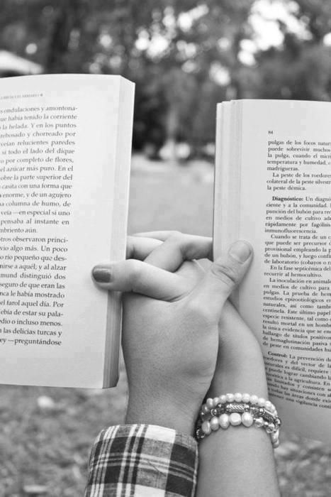 A couple holding hands in agreement
