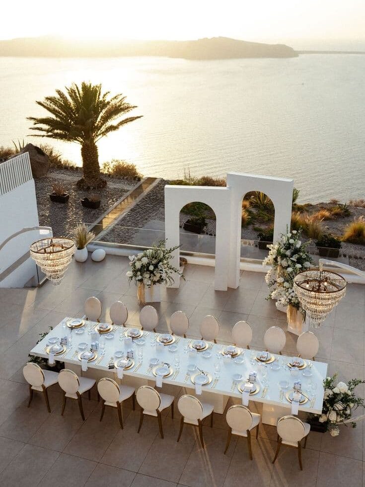 outdoor destination wedding setup in Santorini Greece