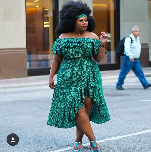 
Confident plus-size woman embracing fashion, self-confidence, and personal style