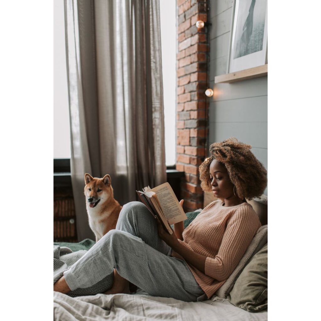 stay at home mom relaxing with a book living the soft life at home