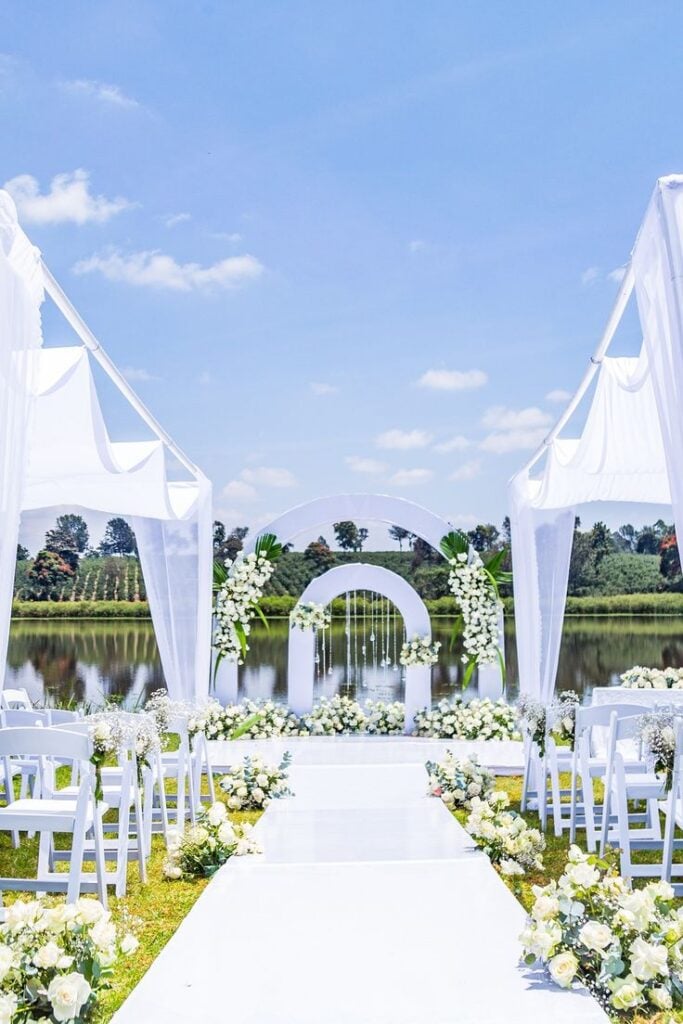 Outdoor wedding reception venue well decorated with flowers