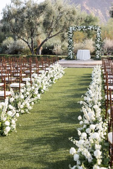 White and Green Floral Aisle Arrangements