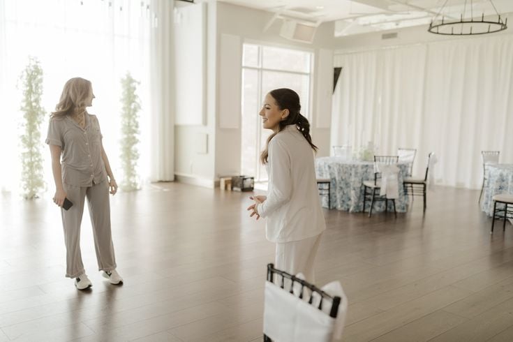 Two women checking out a venue